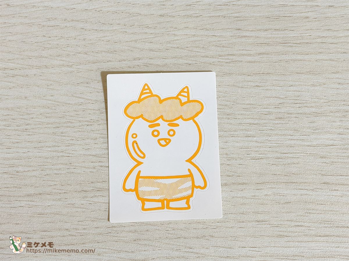 オレンジ色の鬼が描かれたONICHA限定ステッカー